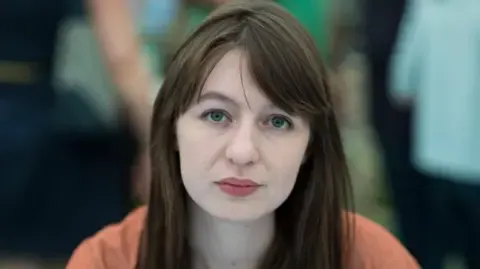 Sally Rooney states she is unable to enter the UK because of legal concerns
