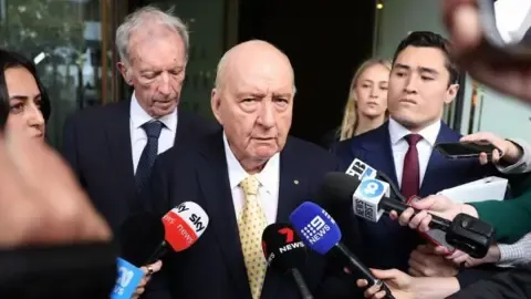 Sex Abuse Charges Against Prominent Australian Broadcaster Lessened